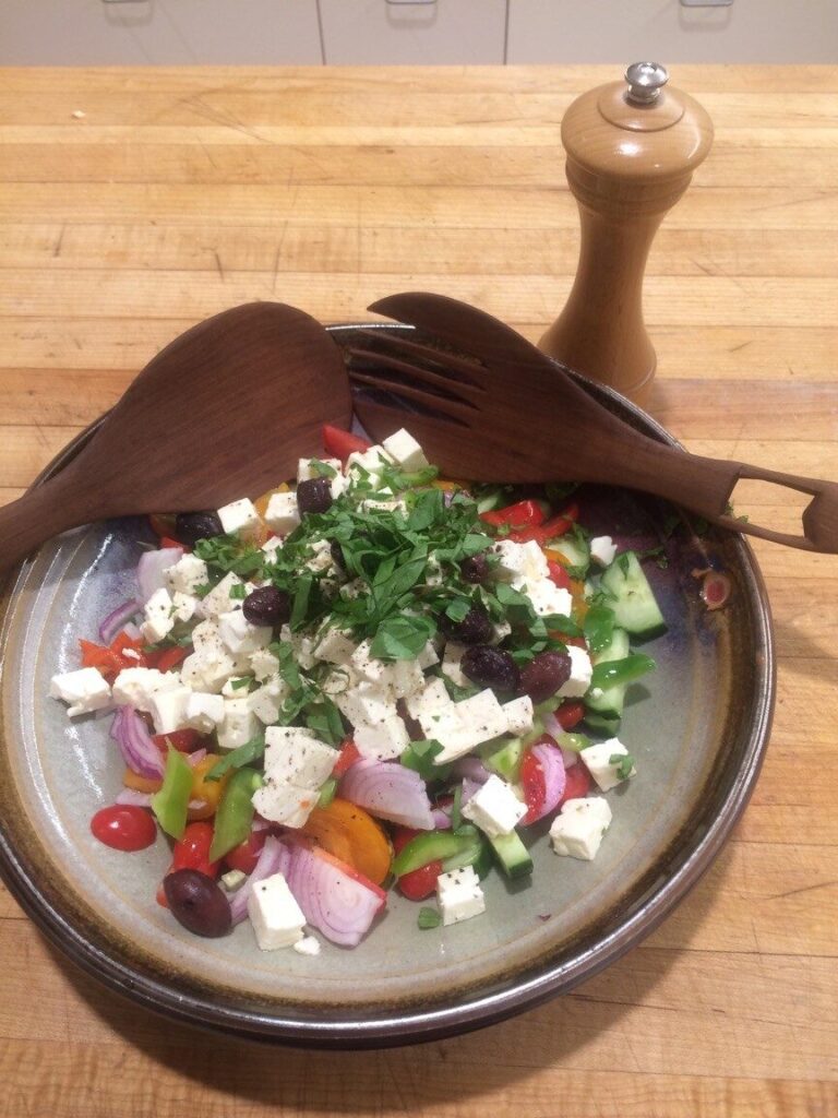 This delicious Greek salad is a wonderful way to use garden vegetables, and add pops of flavor without using much salt.