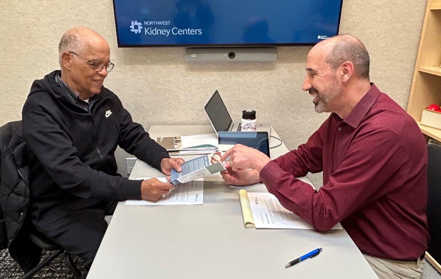 Northwest Kidney Centers' registered dietitian Gregory Wisont works with a kidney patient on nutritional health.